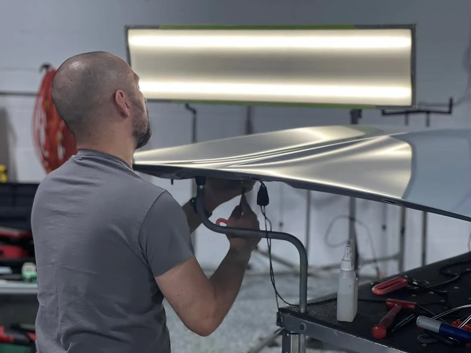 A United PDR Group technician at work on a vehicle panel